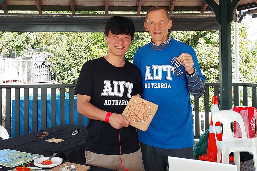Researchers take part in a fair